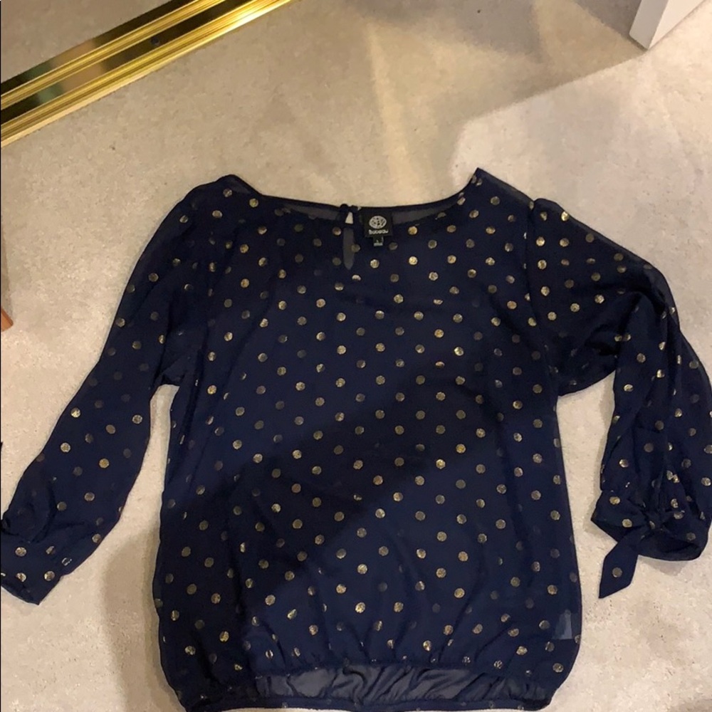 Navy blue and gold shear blouse.